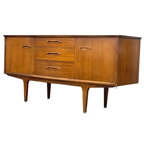 864 - A Mid Century teak sideboard by Jentique. 1960’s. 152x44.5x75cm