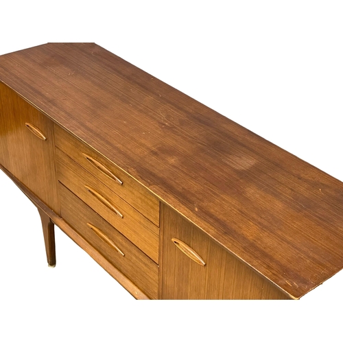 864 - A Mid Century teak sideboard by Jentique. 1960’s. 152x44.5x75cm