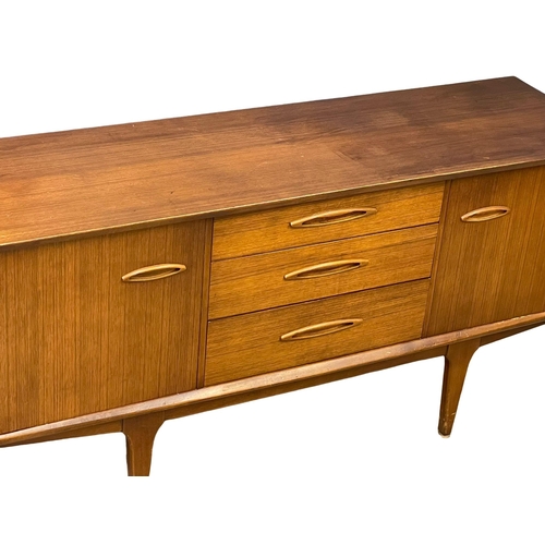 864 - A Mid Century teak sideboard by Jentique. 1960’s. 152x44.5x75cm