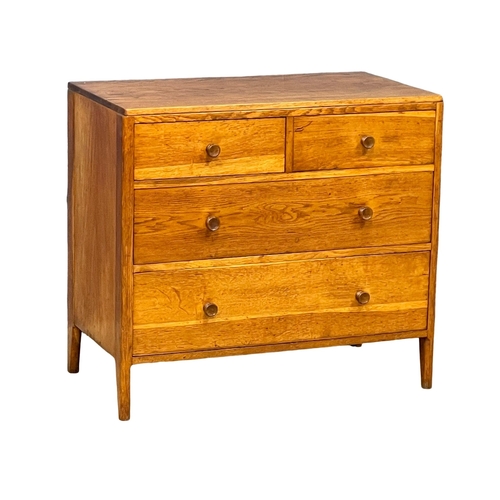 An early to mid 20th century Heals style oak chest of drawers by Angus ...