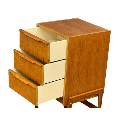 875 - A Danish Mid Century teak chest of drawers by Steens. 40x41x88cm