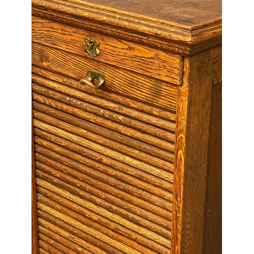 880 - An Edwardian oak tambour door filing cabinet.  47.5x42x119.5cm