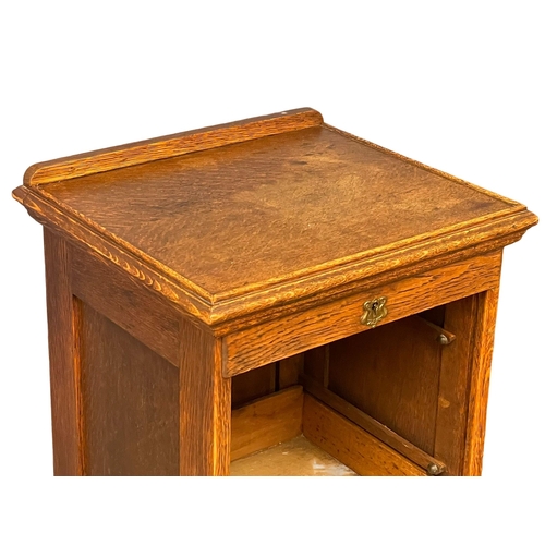 880 - An Edwardian oak tambour door filing cabinet.  47.5x42x119.5cm