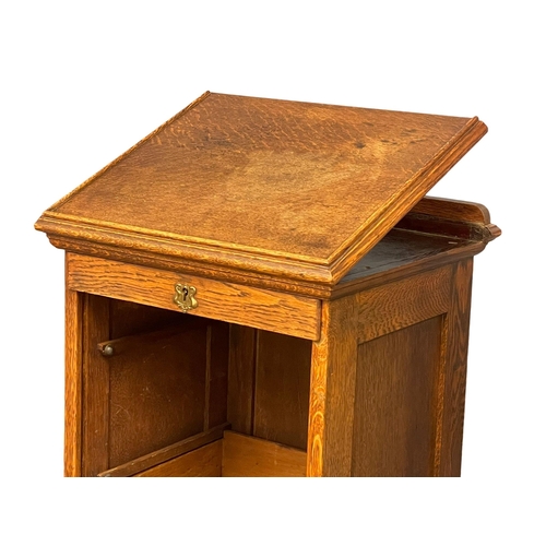 880 - An Edwardian oak tambour door filing cabinet.  47.5x42x119.5cm