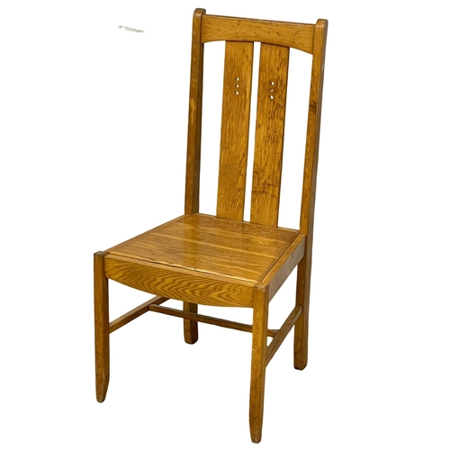 881 - A set of 6 vintage oak high back dining chairs in the style of Charles Rennie Mackintosh.