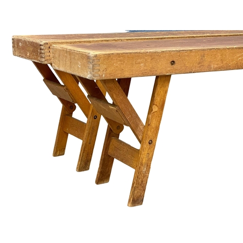 889 - A pair of large vintage folding benches. 182x25x43cm