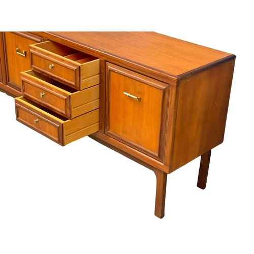 890 - A good quality Mid Century teak sideboard. 184x46x79cm