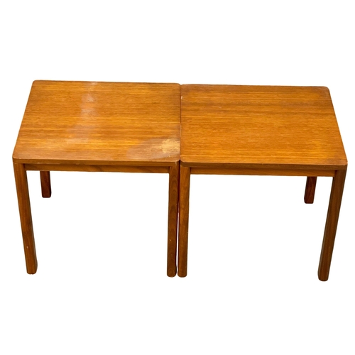 896 - A pair of Danish Mid Century teak end tables. 42x38x40cm