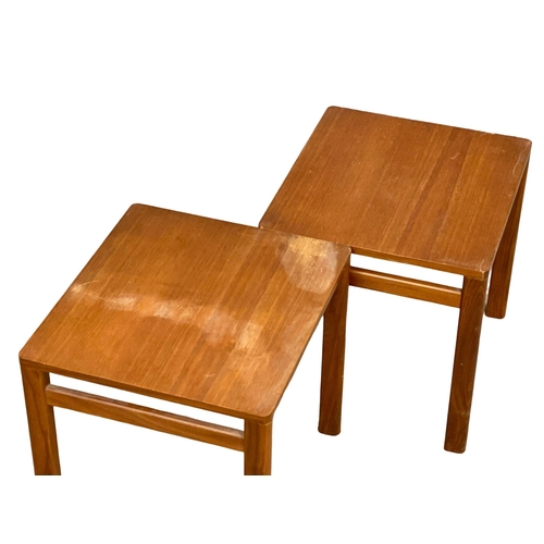 896 - A pair of Danish Mid Century teak end tables. 42x38x40cm