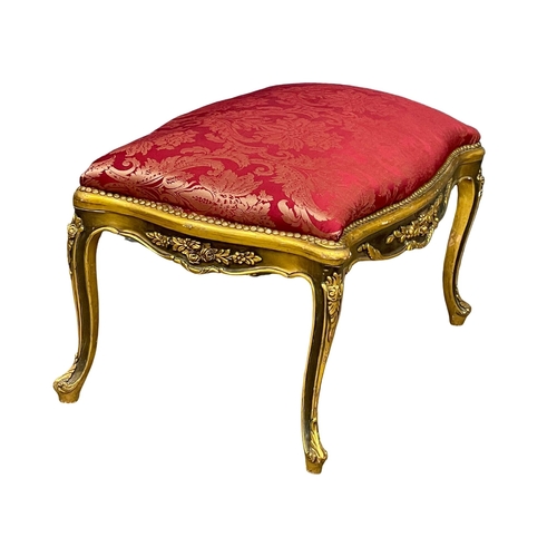 897 - A large good quality 18th century style French gilded Boudoir stool. 105x63x60cm