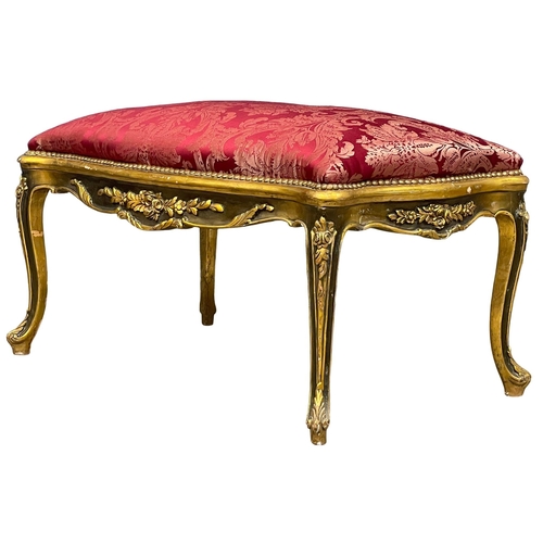 897 - A large good quality 18th century style French gilded Boudoir stool. 105x63x60cm