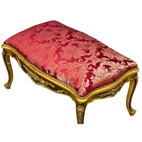 897 - A large good quality 18th century style French gilded Boudoir stool. 105x63x60cm