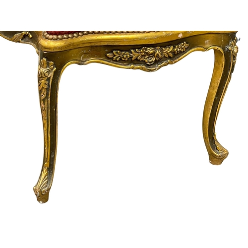 897 - A large good quality 18th century style French gilded Boudoir stool. 105x63x60cm