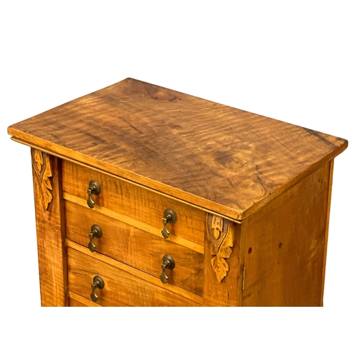 910 - A Victorian Walnut Wellington chest of drawers. 54x37x108.5cm