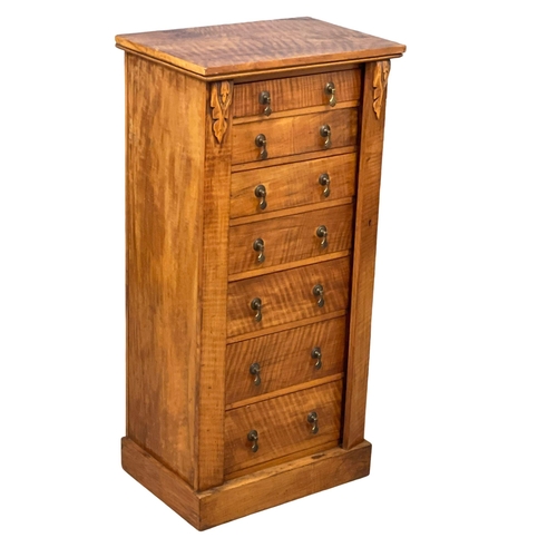 910 - A Victorian Walnut Wellington chest of drawers. 54x37x108.5cm