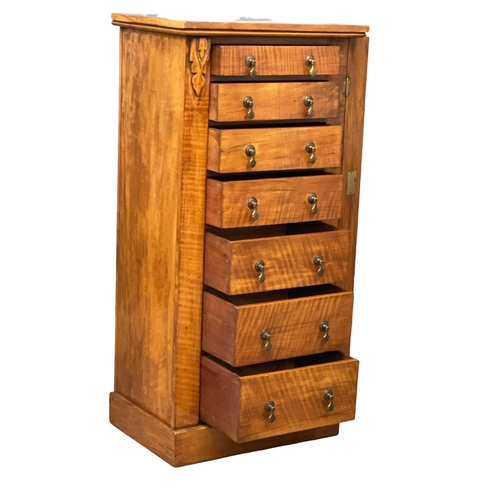 910 - A Victorian Walnut Wellington chest of drawers. 54x37x108.5cm