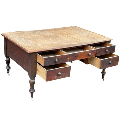 918 - A large Victorian mahogany partners desk. 154x107x76cm