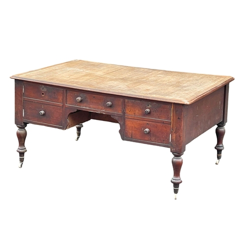 918 - A large Victorian mahogany partners desk. 154x107x76cm