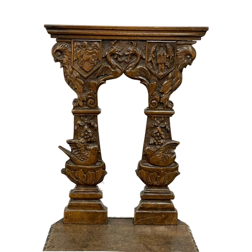 919 - A late 19th century Italian carved oak hall chair. Circa 1880.