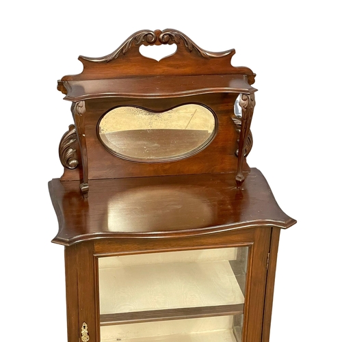 926 - An Edwardian mahogany display cabinet. 67x37x146cm