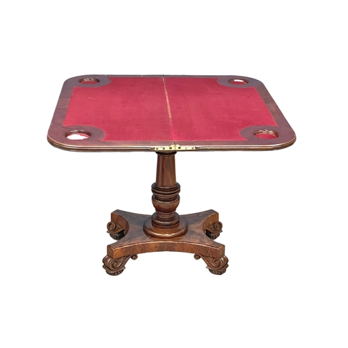 930 - A William IV mahogany turnover games table. Circa 1830.