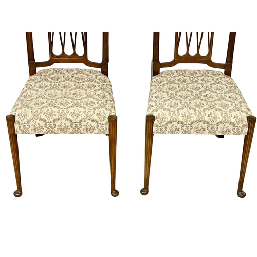 931 - A pair of Edwardian inlaid mahogany high back side chairs.