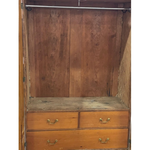 937 - A Victorian Satin Birch wardrobe. 132x61x199cm