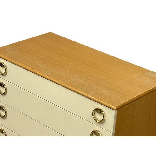 947 - A Mid Century chest of drawers by Schreiber. 75x40x93cm