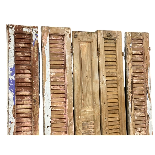 969 - A set of 5 large 19th century French pine shutters. 208cm