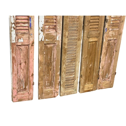 969 - A set of 5 large 19th century French pine shutters. 208cm