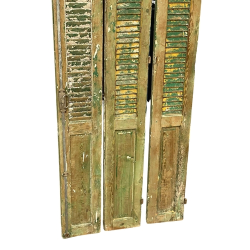 970 - A set of 3 large 19th century French pine shutters with original paintwork. 207.5cm