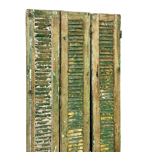 970 - A set of 3 large 19th century French pine shutters with original paintwork. 207.5cm