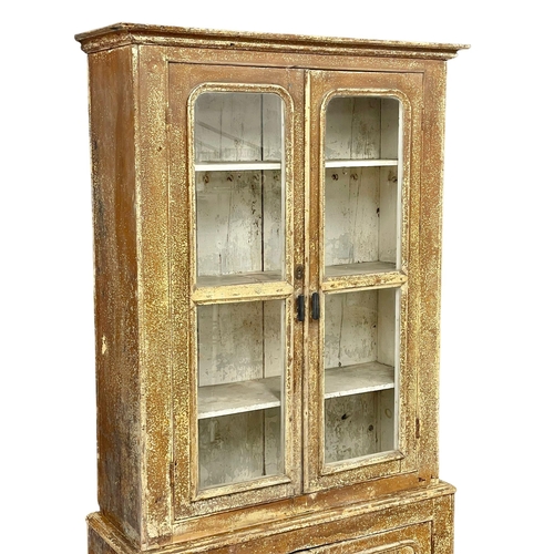 972 - A Victorian pine Country House bookcase with original scumble paint. 107x36x203cm