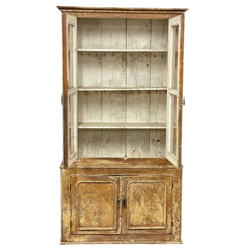 972 - A Victorian pine Country House bookcase with original scumble paint. 107x36x203cm