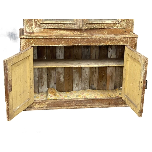 972 - A Victorian pine Country House bookcase with original scumble paint. 107x36x203cm