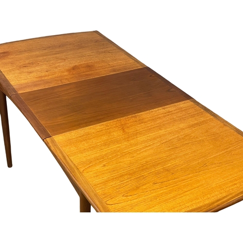 974 - A G-Plan Fresco Mid Century teak extending dining table. 1960’s. Open 193cm. Closed 147x88.5x74cm.