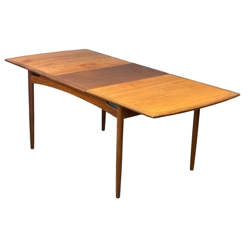 974 - A G-Plan Fresco Mid Century teak extending dining table. 1960’s. Open 193cm. Closed 147x88.5x74cm.