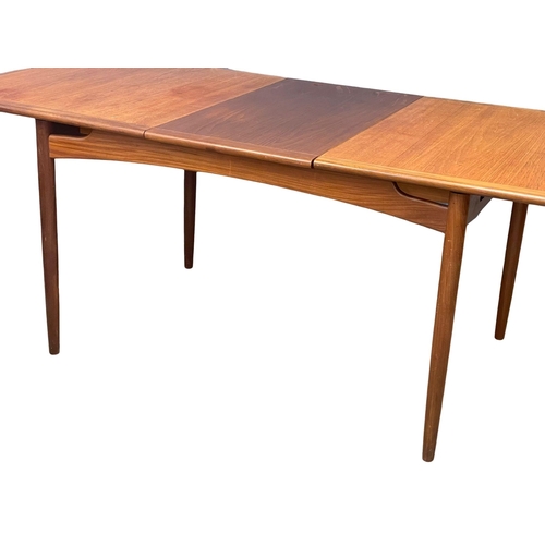 974 - A G-Plan Fresco Mid Century teak extending dining table. 1960’s. Open 193cm. Closed 147x88.5x74cm.