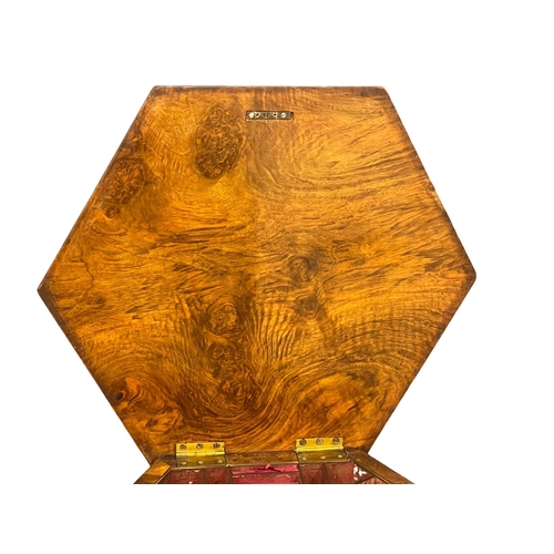 975 - A good quality Victorian Burr Walnut work table with inlays which include Lebanon Cedar and Olive Wo... 