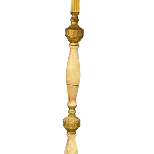 989 - A vintage ornate brass and onyx standard lamp. 180cm