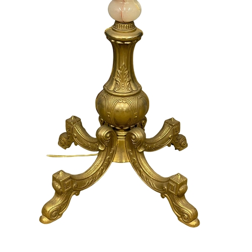 989 - A vintage ornate brass and onyx standard lamp. 180cm