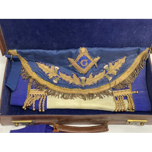 753 - A vintage Scottish Master Masonic apron, sash and medal in original leather case.