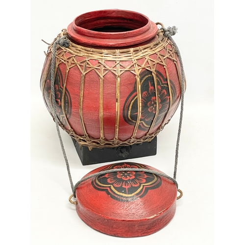 756 - A Chinese wooden rice container. 26x30cm