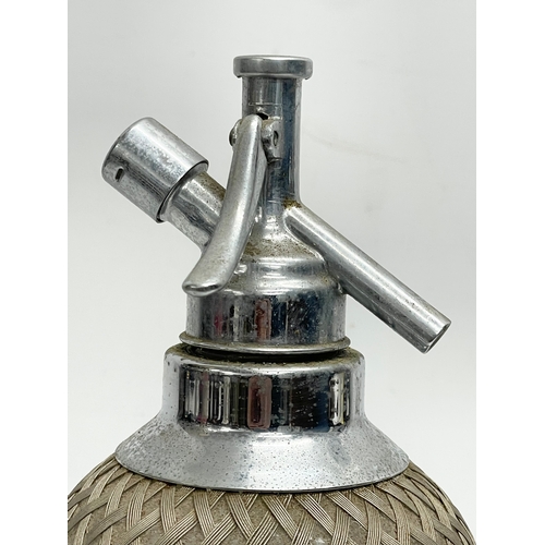 758 - A vintage soda syphon. 34cm.