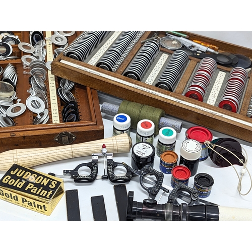 760 - A quantity of vintage optometry equipment.