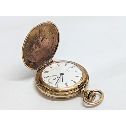 591 - An ornate vintage rolled gold ladies pocket watch, by Elgin.