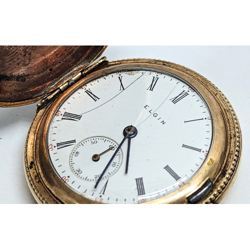 591 - An ornate vintage rolled gold ladies pocket watch, by Elgin.