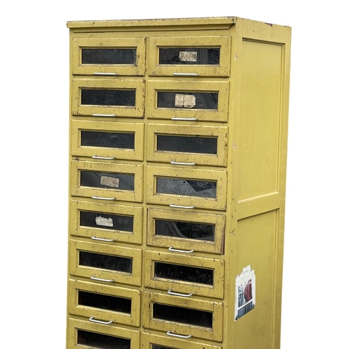 1072 - A large early 20th century Haberdashery multi drawer cabinet with original paint. 1930’s. 75x54x210.... 