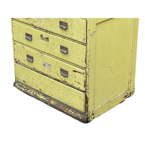 1072 - A large early 20th century Haberdashery multi drawer cabinet with original paint. 1930’s. 75x54x210.... 