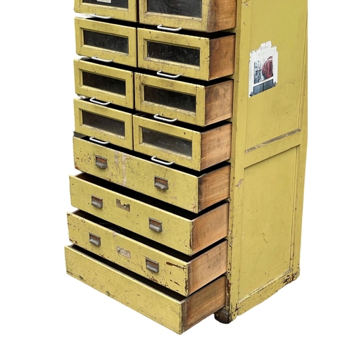 1072 - A large early 20th century Haberdashery multi drawer cabinet with original paint. 1930’s. 75x54x210.... 